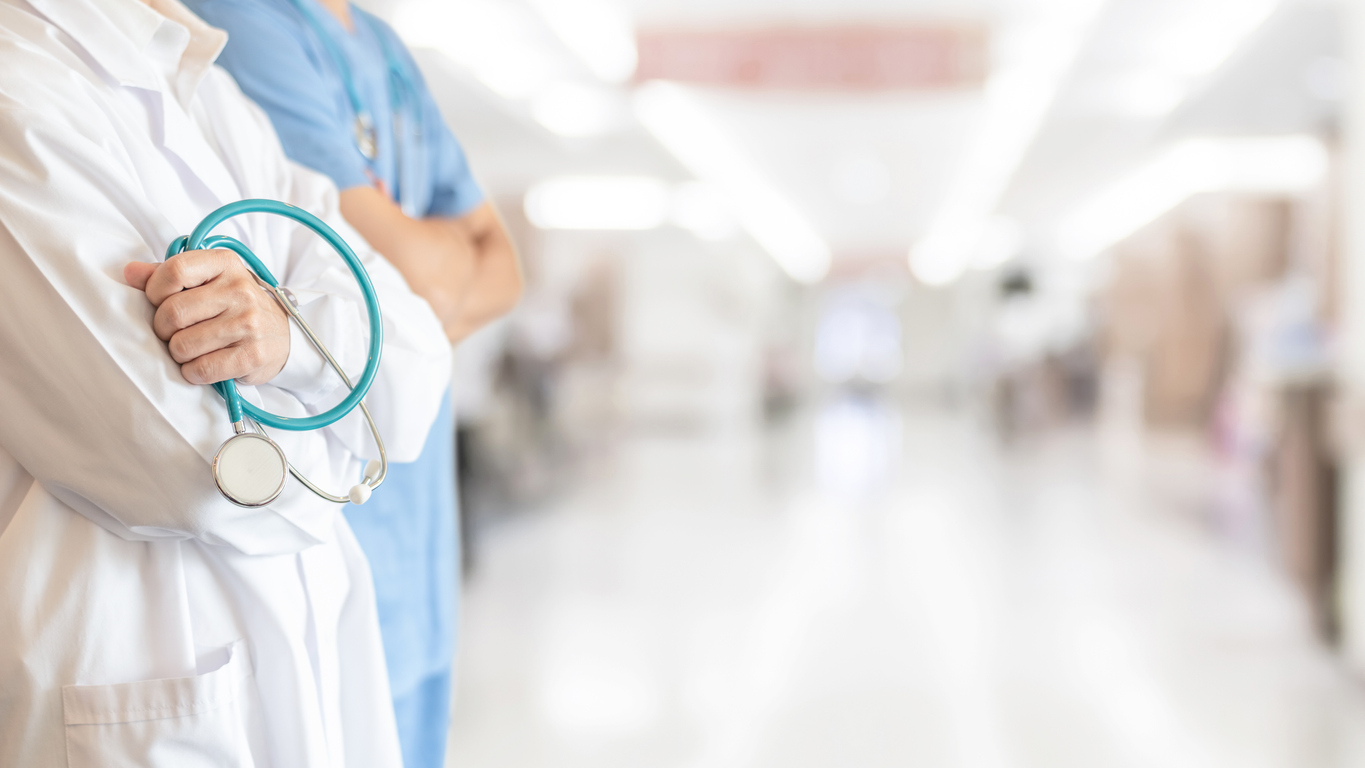 Surgeon and anesthetist doctor ER surgical team with medical clinic room background for emergency nursing care professional teamwork and patient trust in ICU hospital's hospitality concept